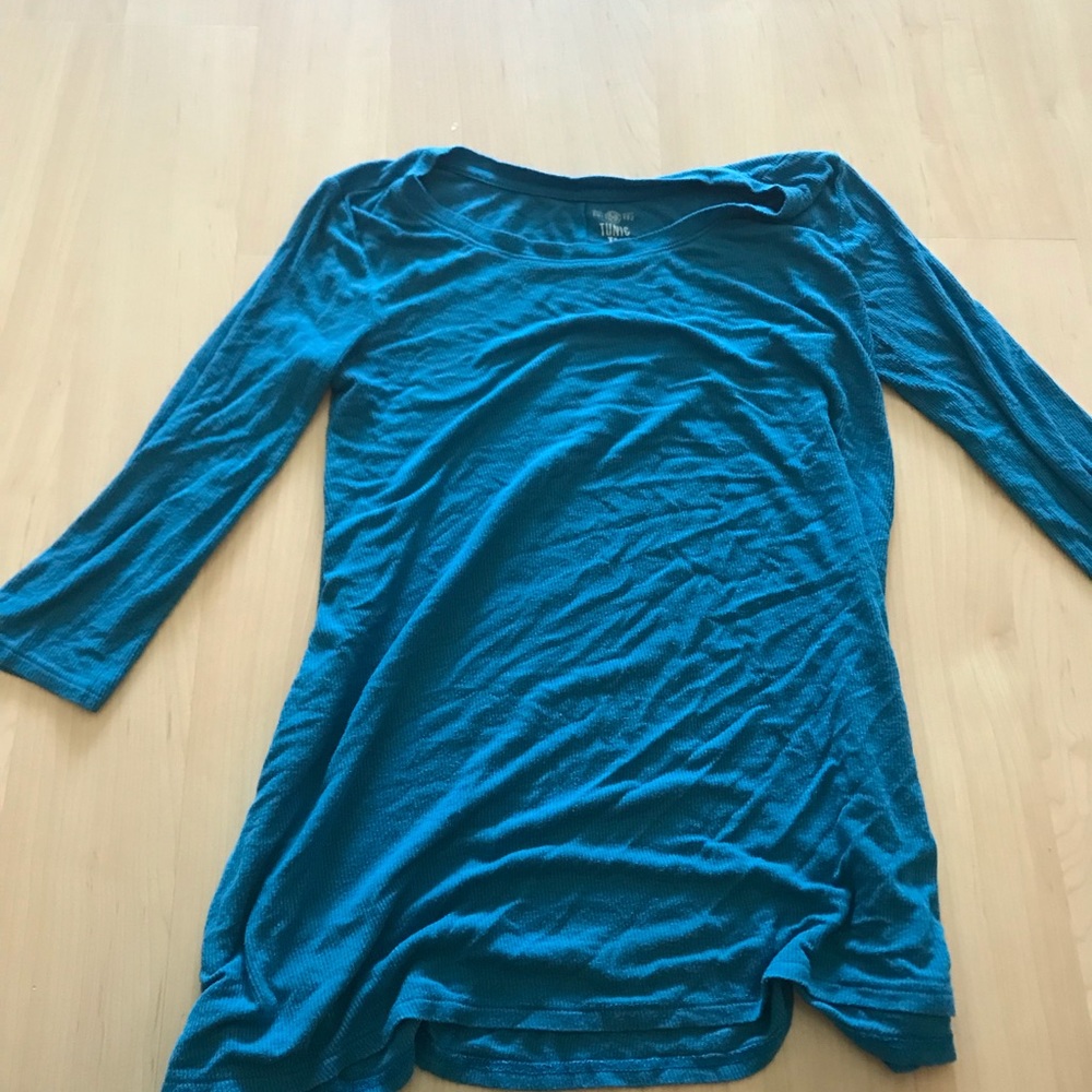 A turquoise blouse